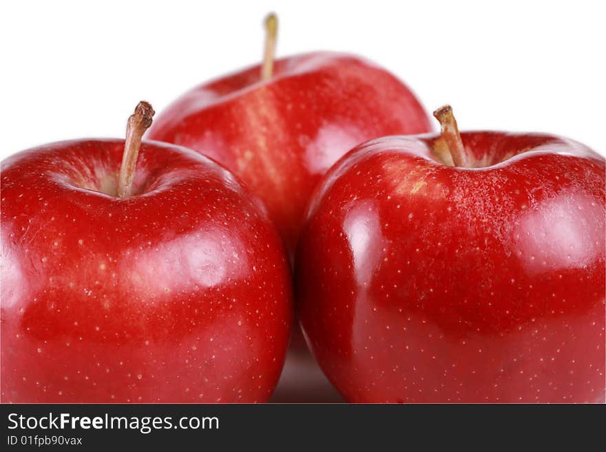 Three shiny red gala apples. Three shiny red gala apples