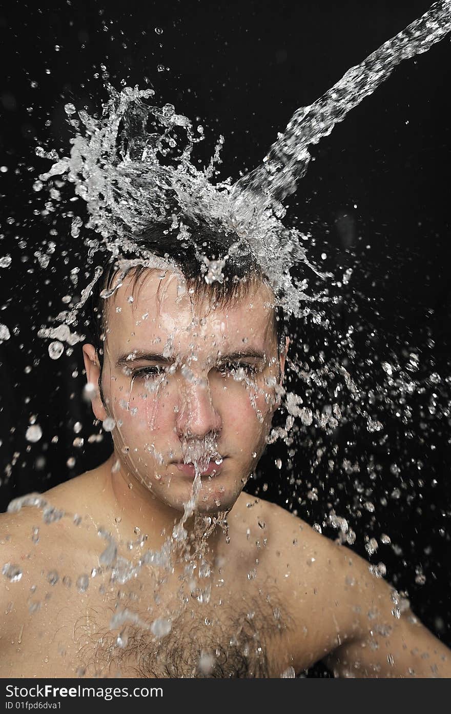 Water splash on Man face