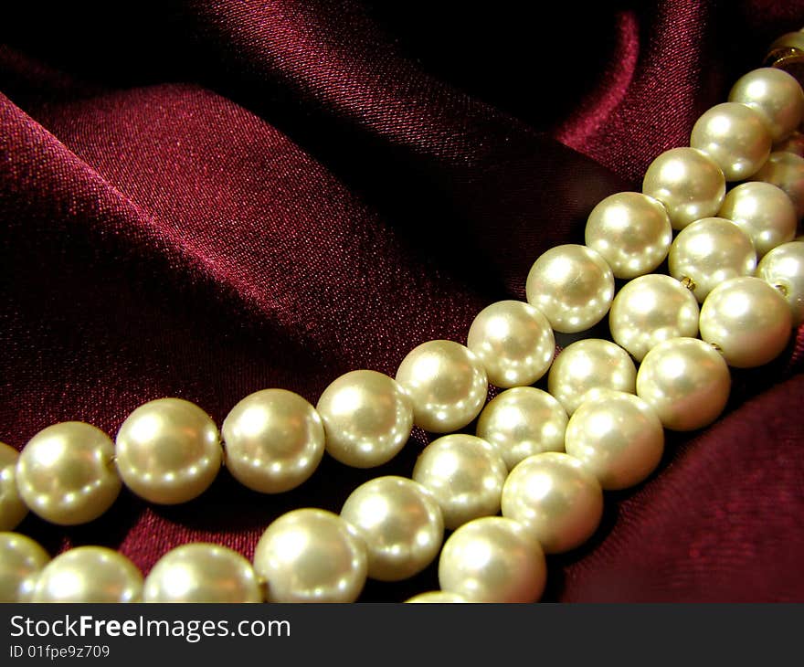 Pearls On Red Silk