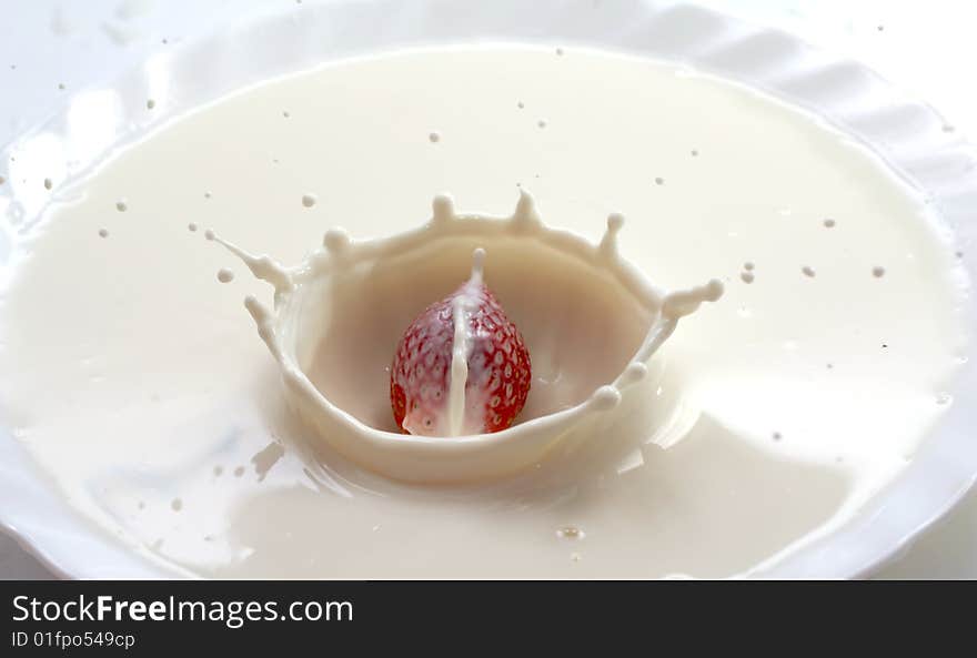 The red Strawberry in cream