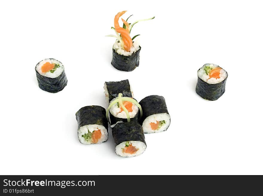 Sushi rolls with salmon and cucumber are isolated on the white background