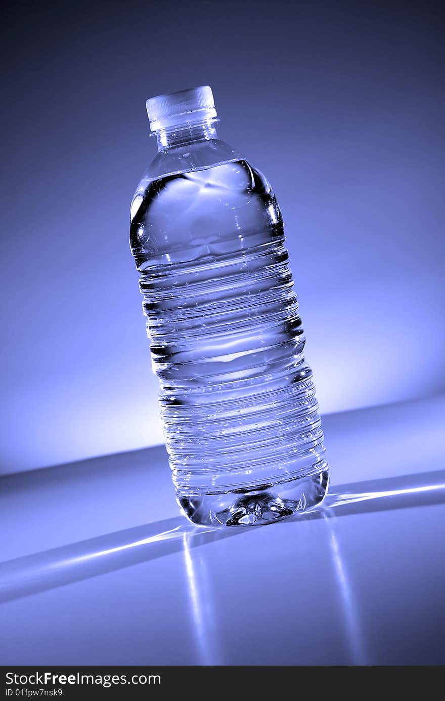 Detail closeup of water bottle with black background