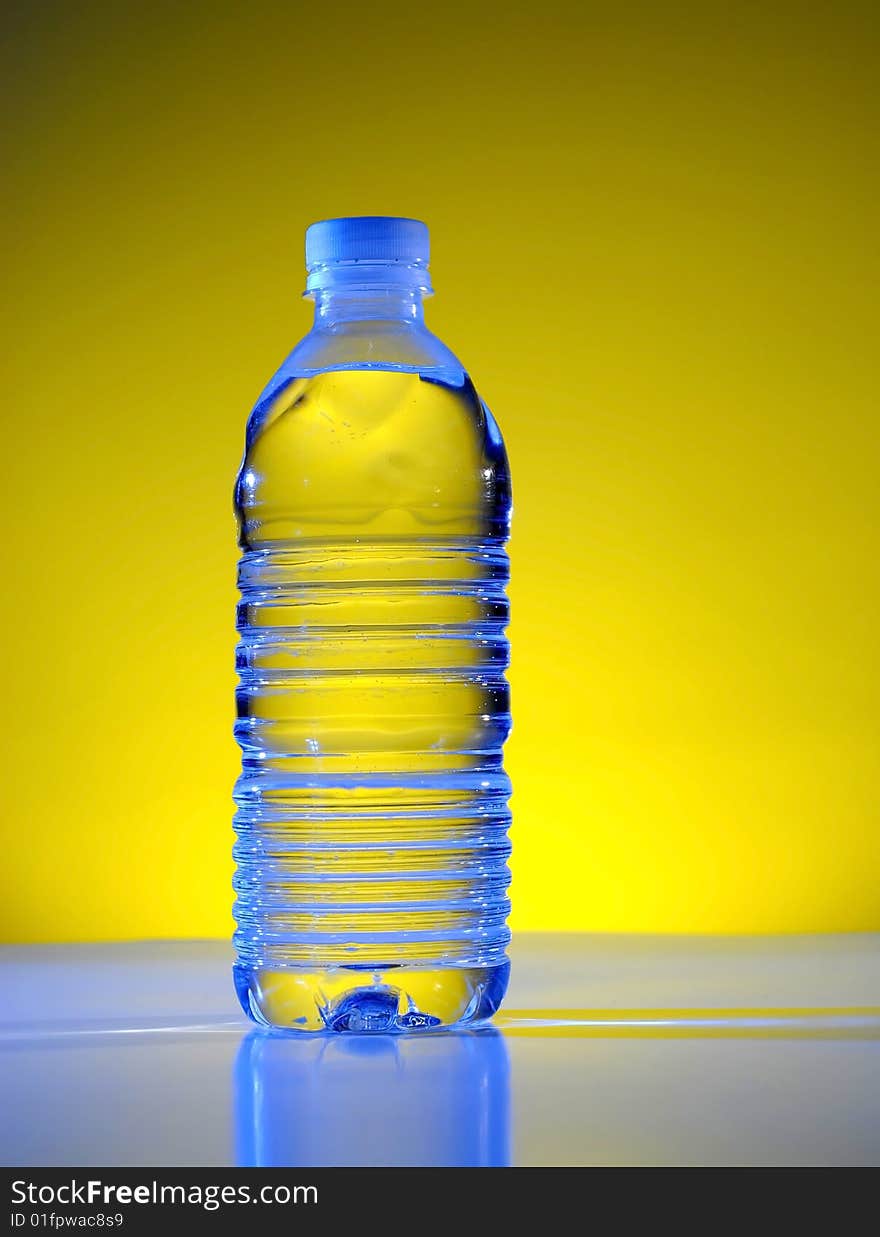 Detail closeup of water bottle with black background