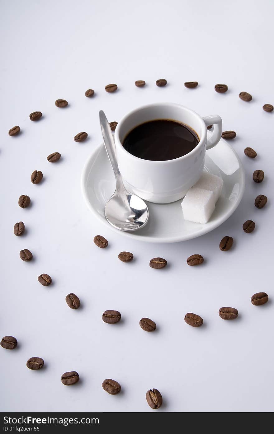 Coffee Cup And Spiral Of Grains