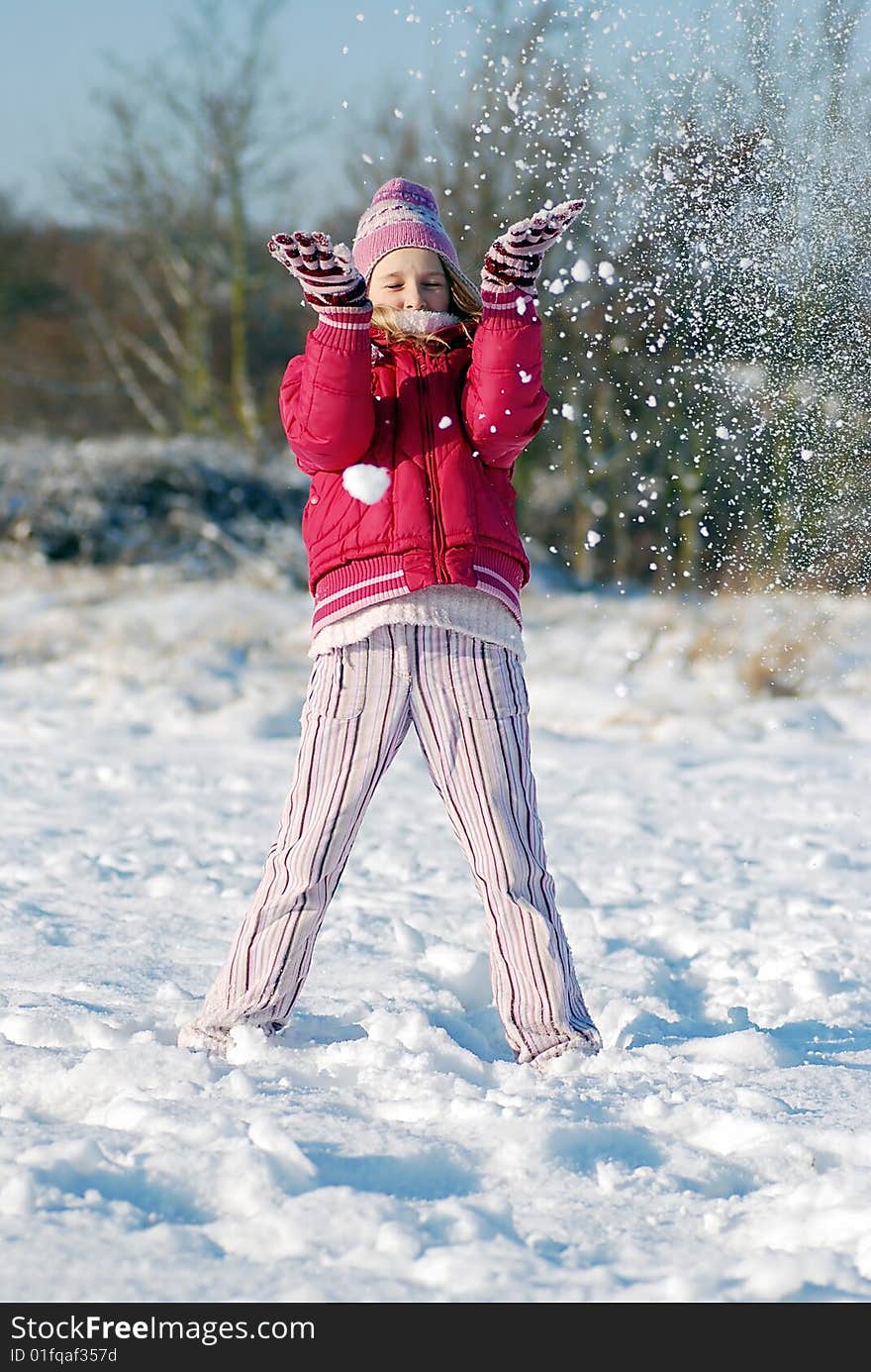 Winter play - girl in the park