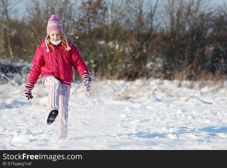 Winter play - girl in the park