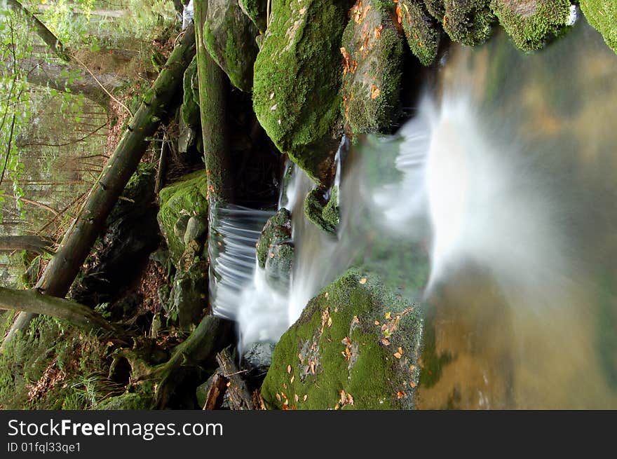 Mountain waterfall in bohemia