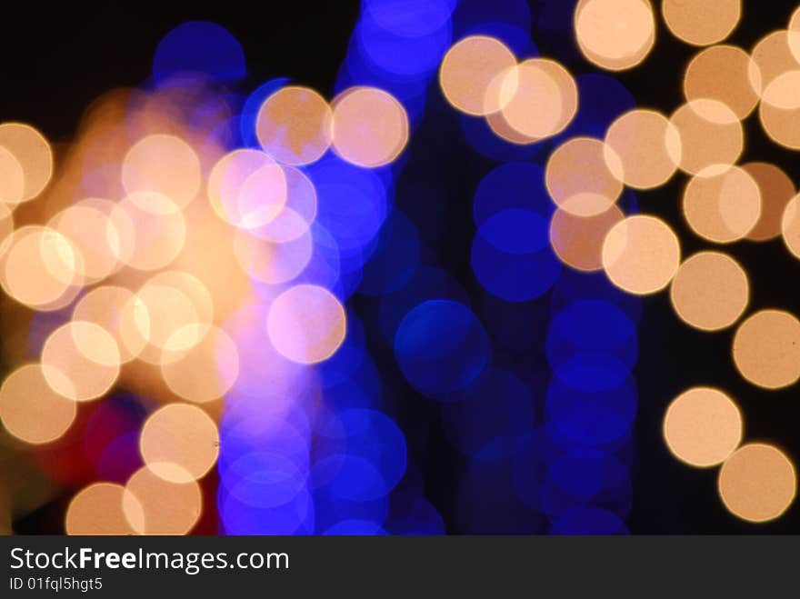 Composition of light spots of electric lamps of dark blue, blue, yellow colors. Composition of light spots of electric lamps of dark blue, blue, yellow colors