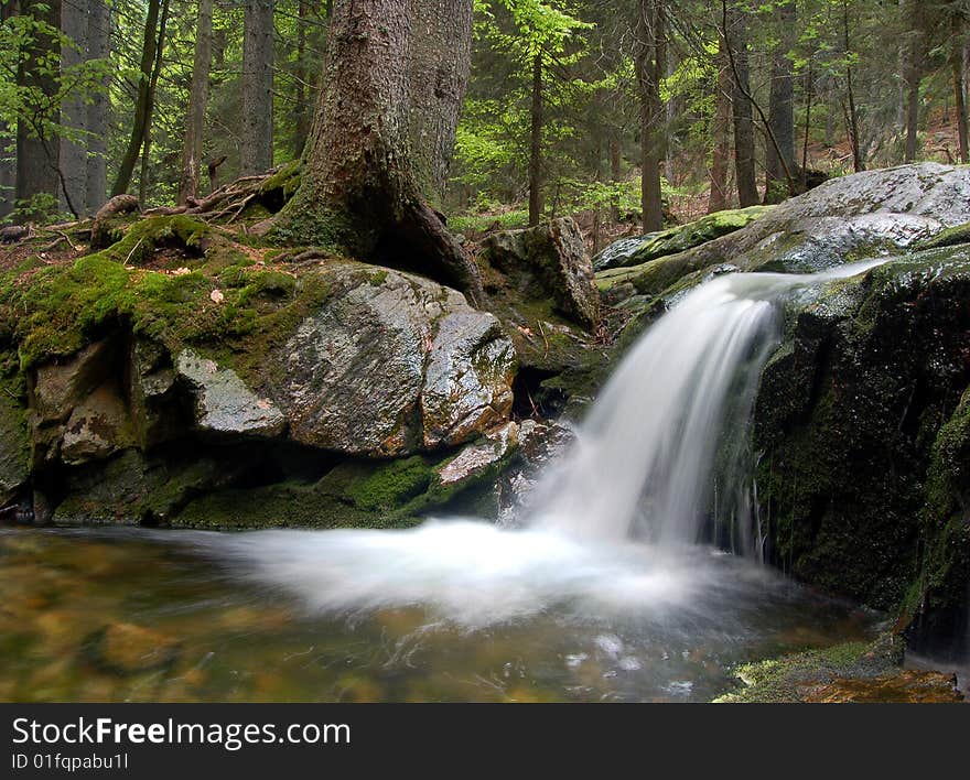 Mountain waterfall in bohemia