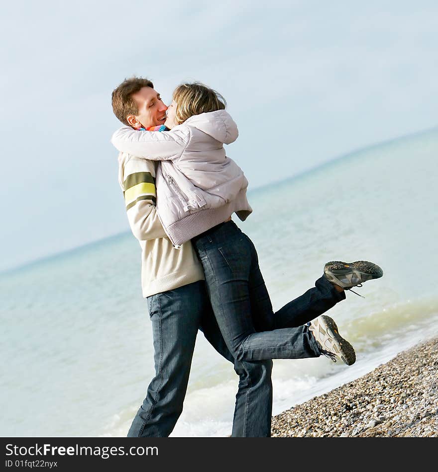 Portrait of young couple on beach