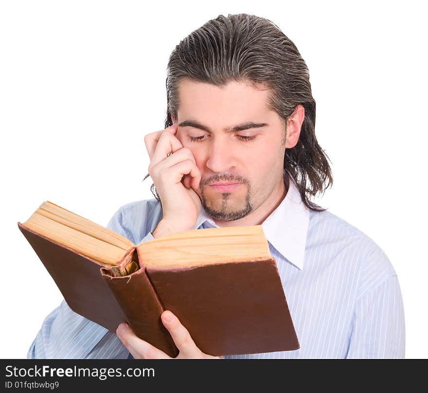 Young dark haired caucasian man in light blue shirt reads book and scratches his head in confusion isolated on white. Young dark haired caucasian man in light blue shirt reads book and scratches his head in confusion isolated on white