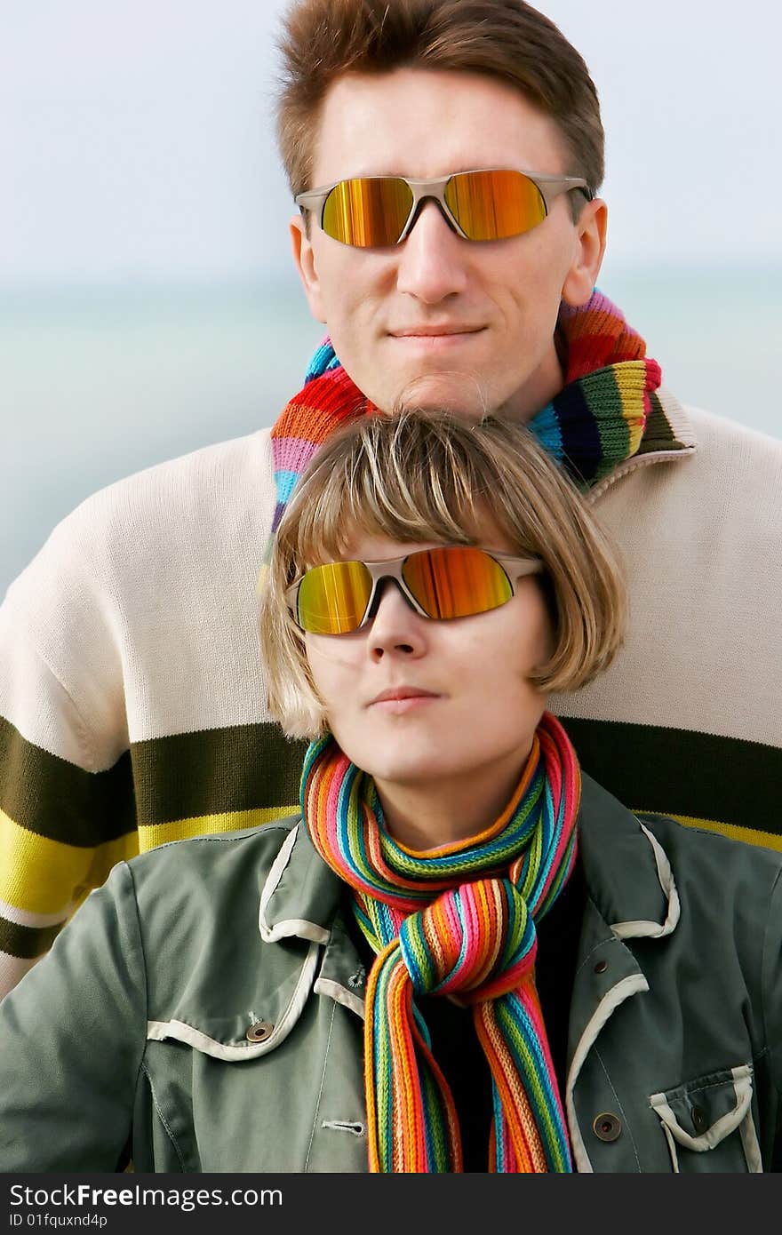 Portrait of young couple in sunglasses