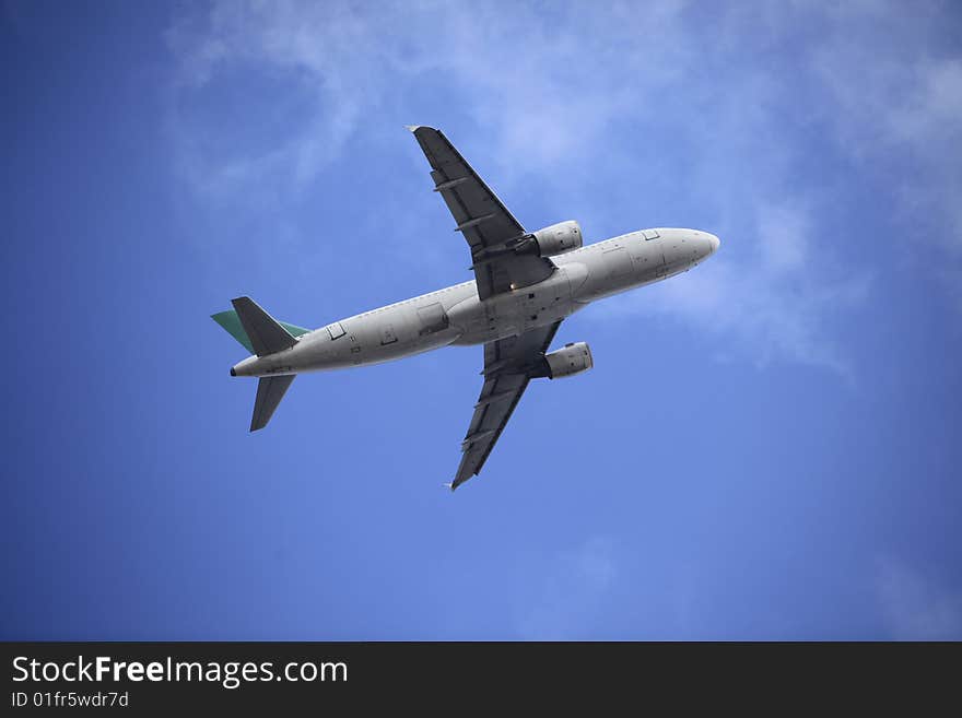 The airplane with blue sky.