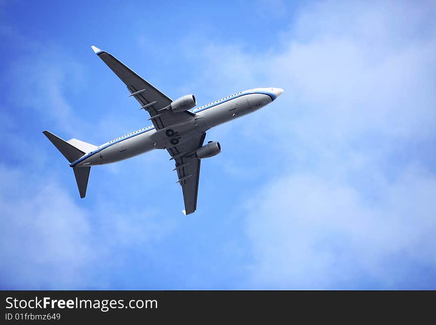 The airplane with blue sky.