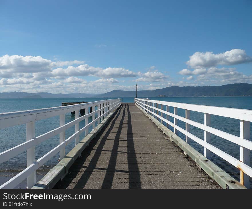 Quay at Seatoun on sunny day and blue sky