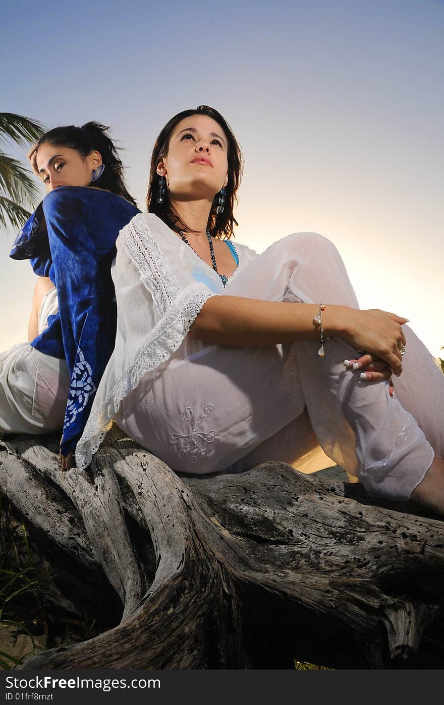 Two females relaxing outdoors