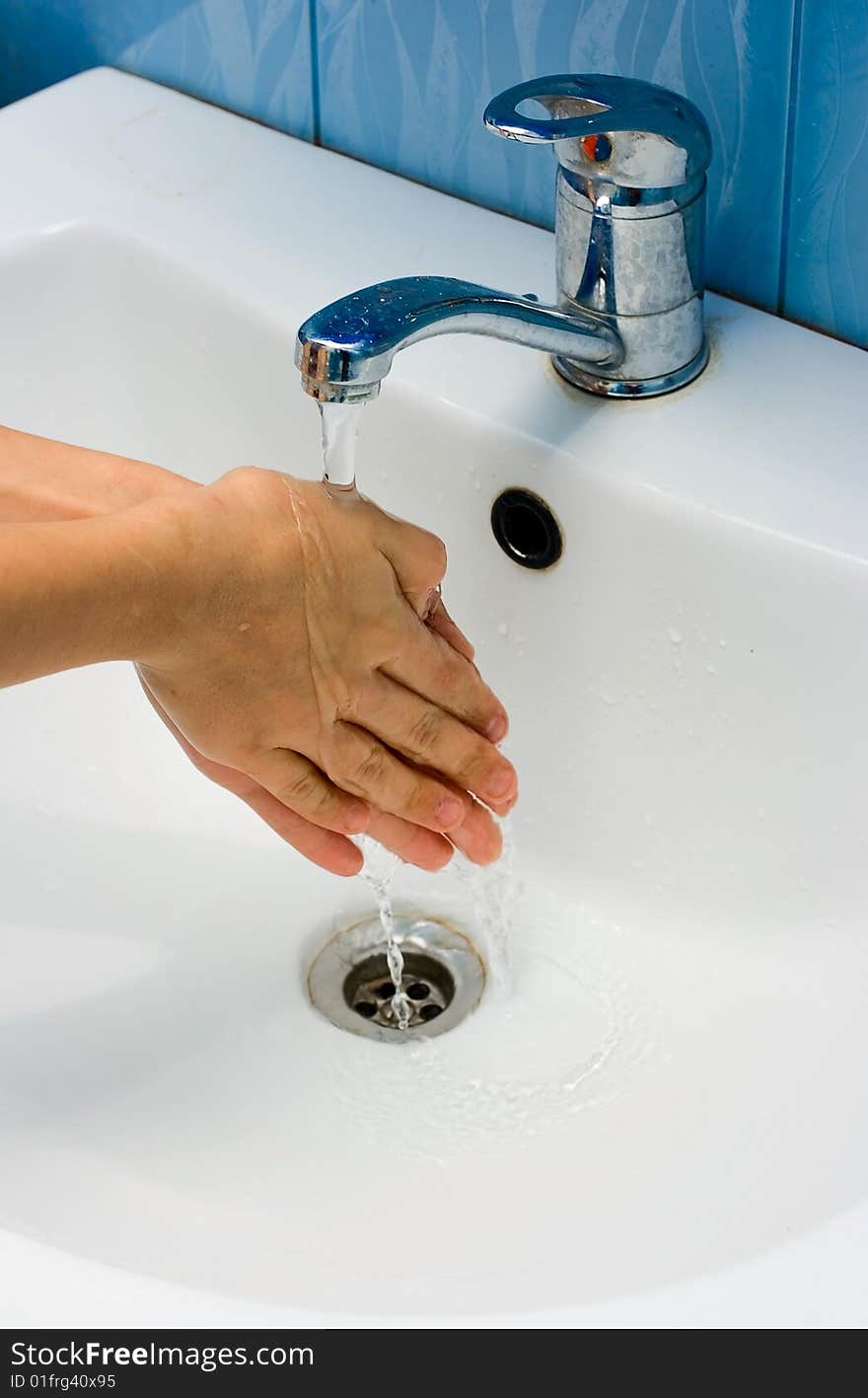 Washing Hands In Bathroom