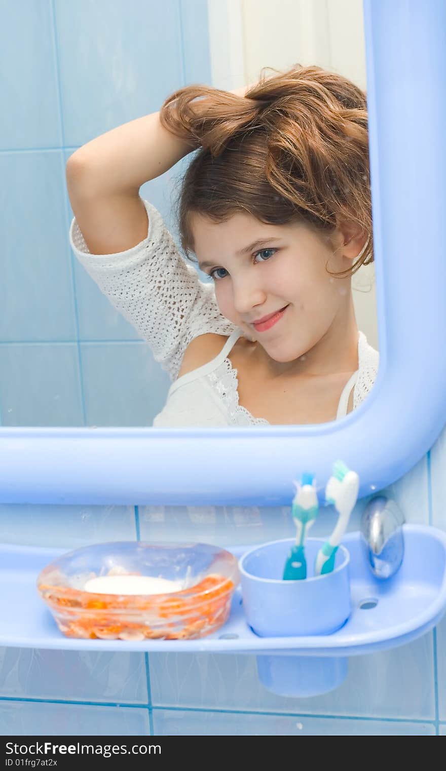 Teen girl in bathroom for your design