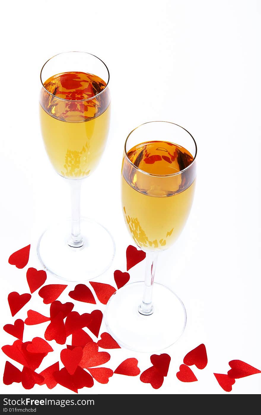 Two Wine Glasses And Small Hearts