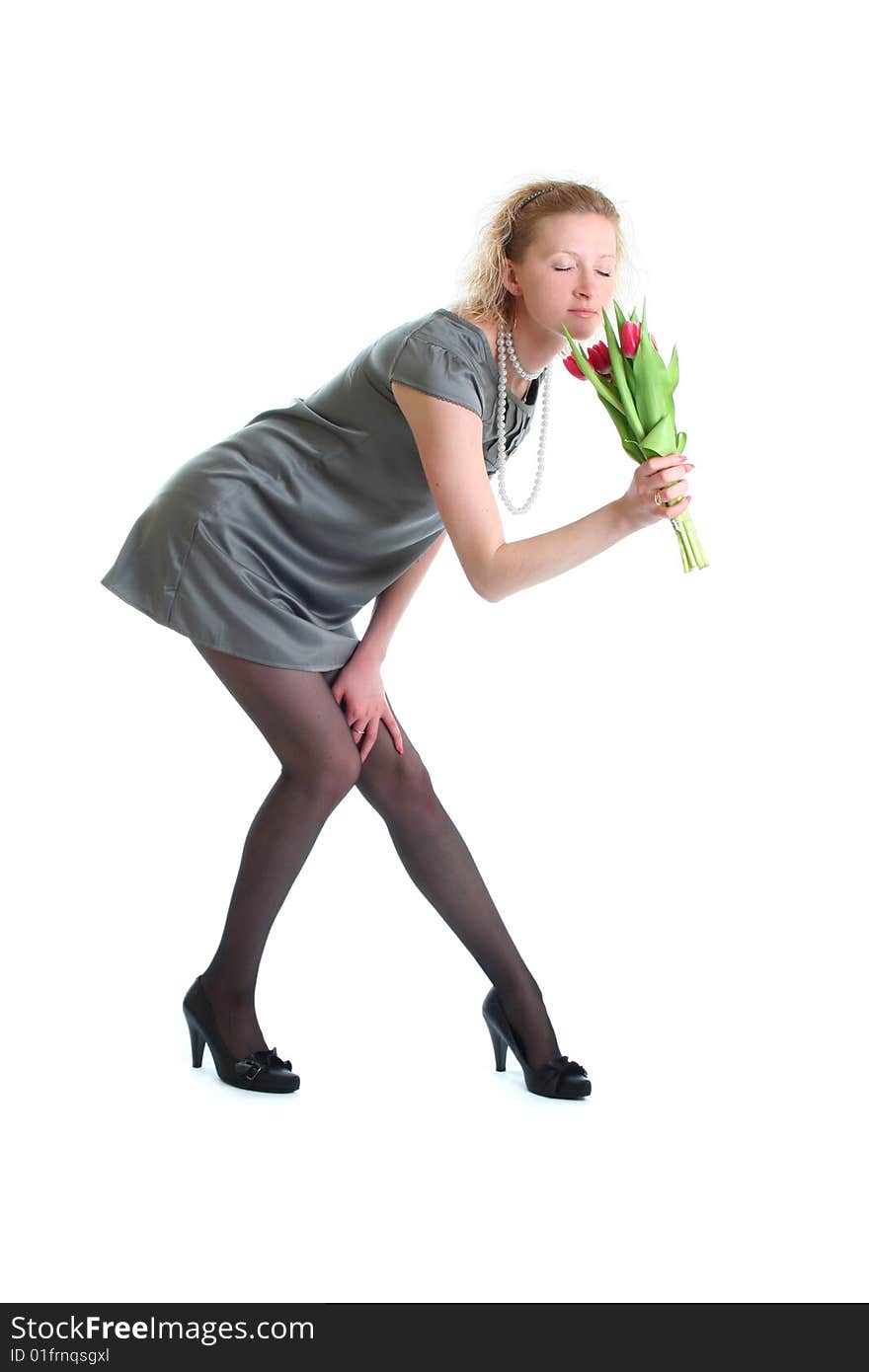 Beautiful young woman with pink tulips. Beautiful young woman with pink tulips