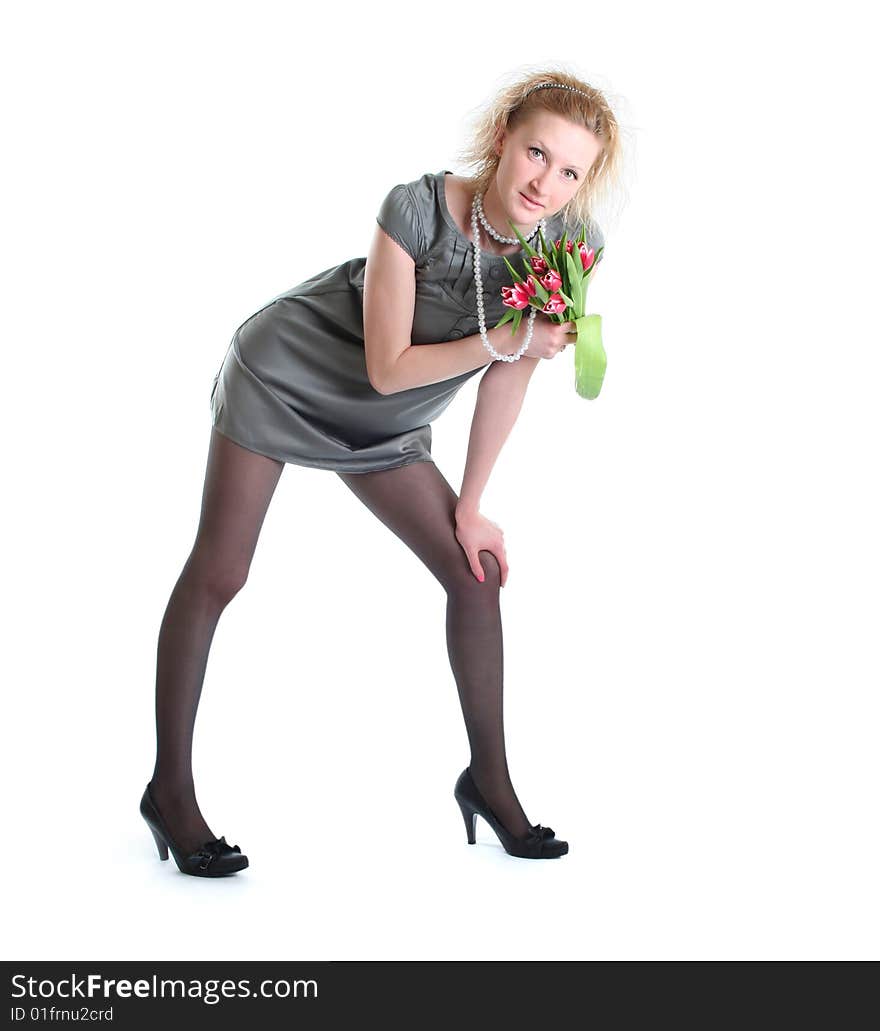 Beautiful young woman with pink tulips. Beautiful young woman with pink tulips