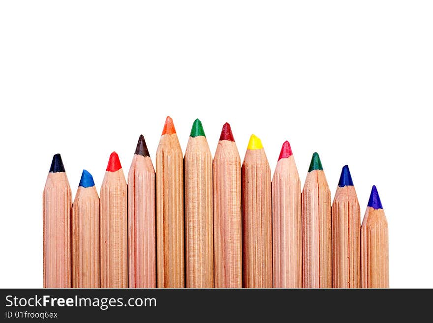 Natural wood colored pencils isolated over a white background