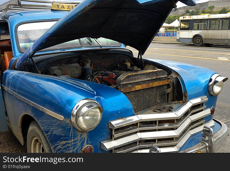 Detail of vintage classic car crashed in the streets of Old havana. Detail of vintage classic car crashed in the streets of Old havana