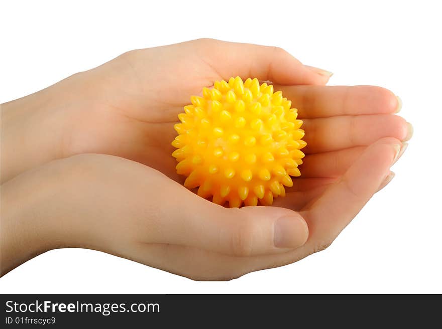 Prickly massage ball in hand isolated on white