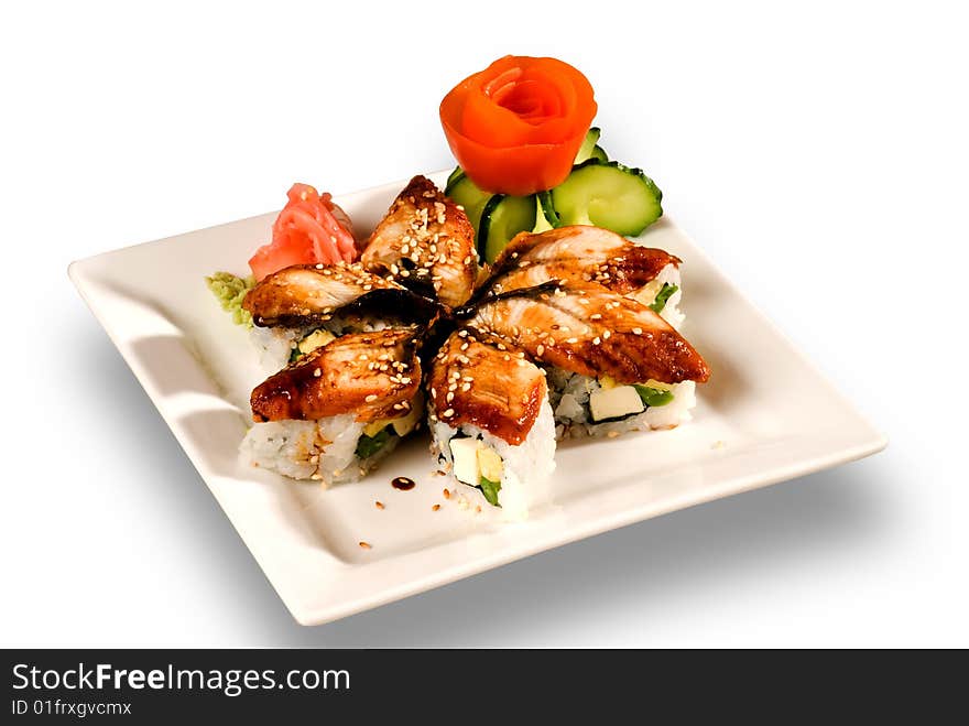 Sushi and salmon on a white plate