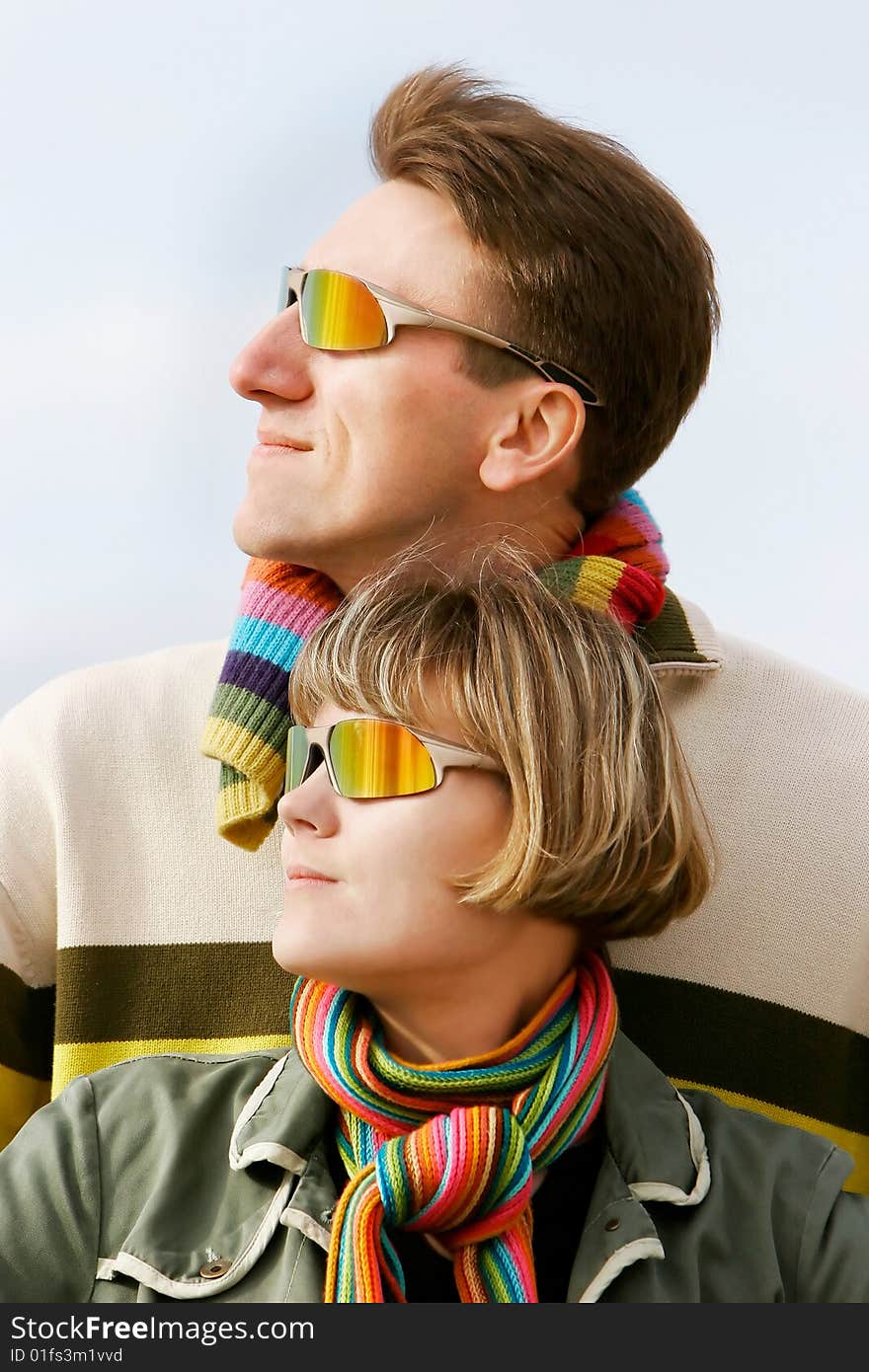 Portrait of young couple in sunglasses