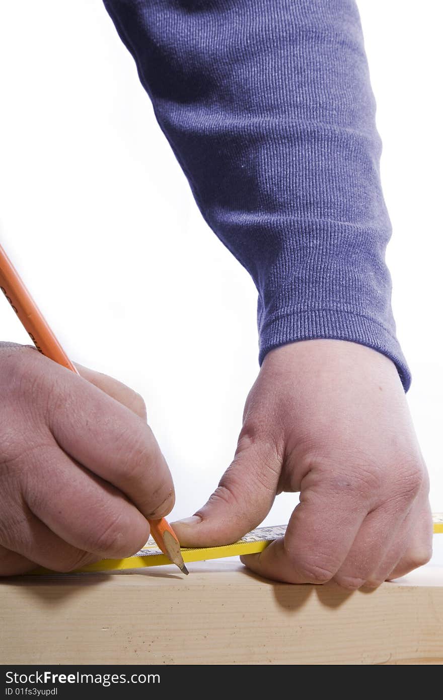 Marking wood with a pencil for construction