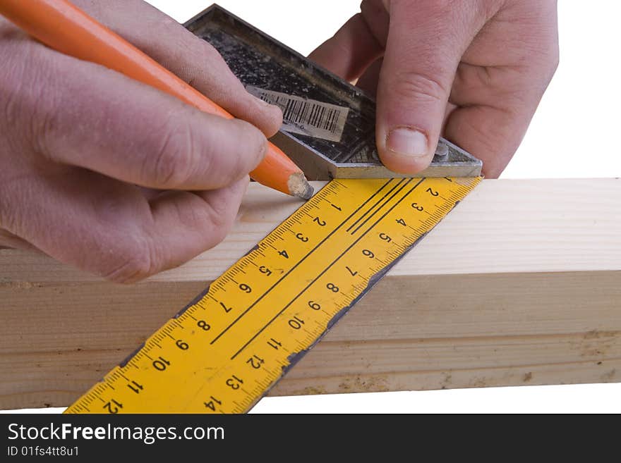 Marking wood on white background