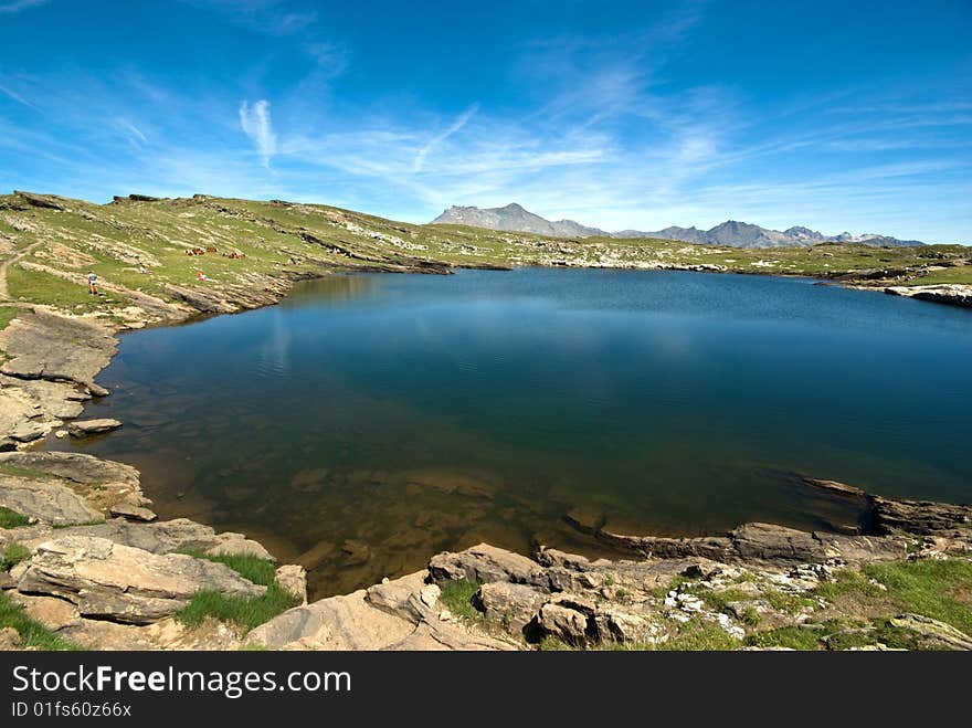 Lake and La Meije mountain landscape. Lake and La Meije mountain landscape