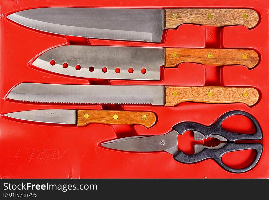 Kitchen knife isolated on white, focus at top of knife