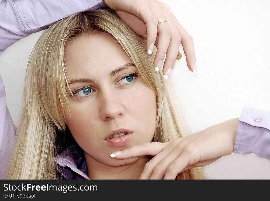 Portrait of blonde young women with beautiful eyes