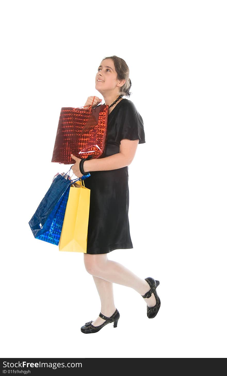 Happy shopping girl with bags