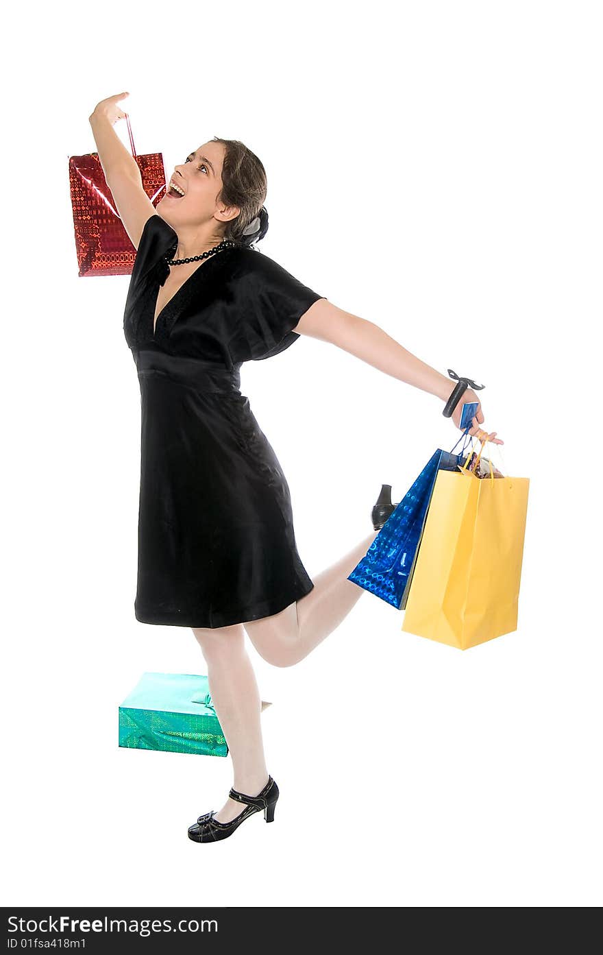 Happy shopping girl with bags