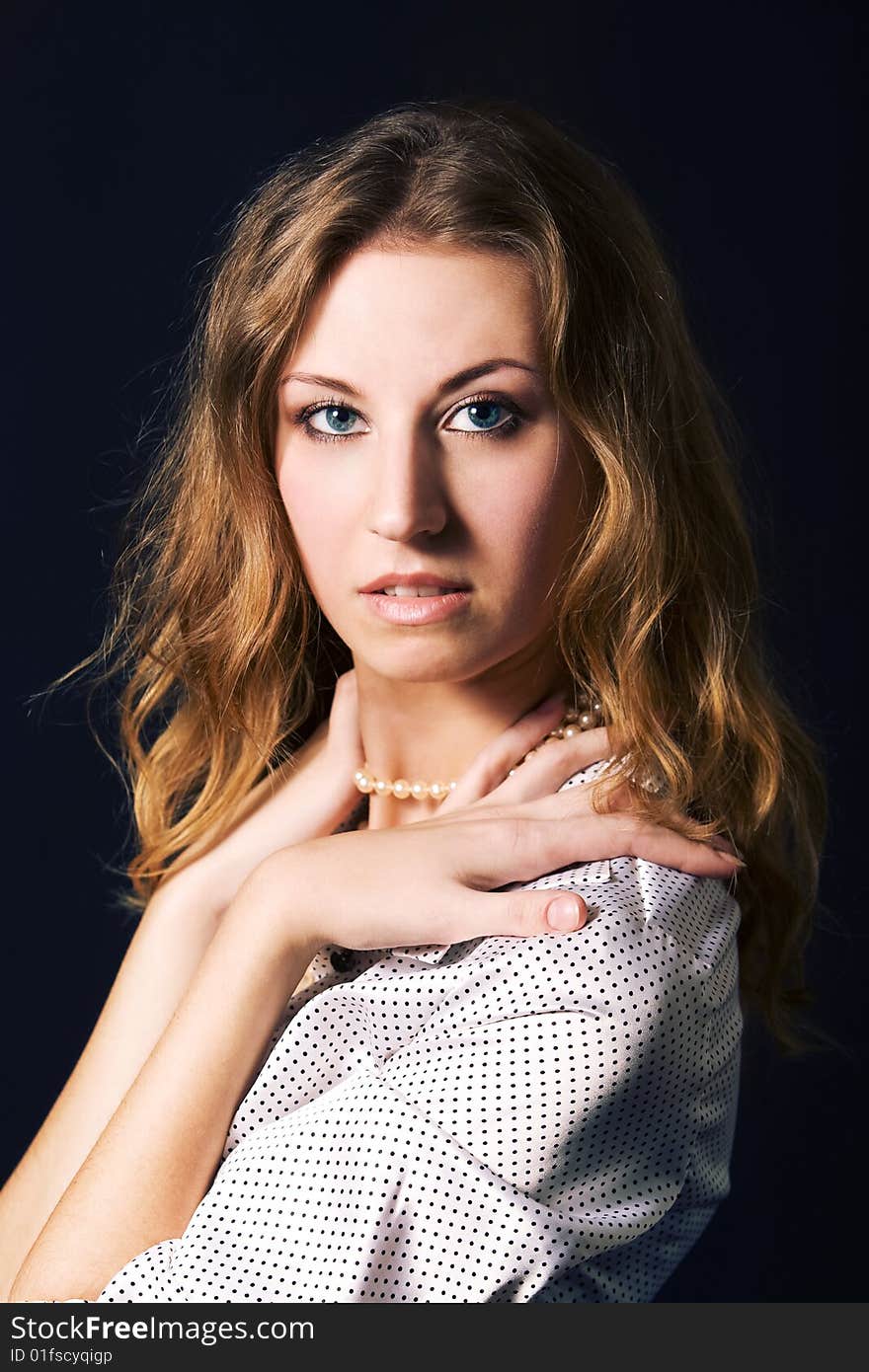 Portrait of young a woman on black background. Portrait of young a woman on black background