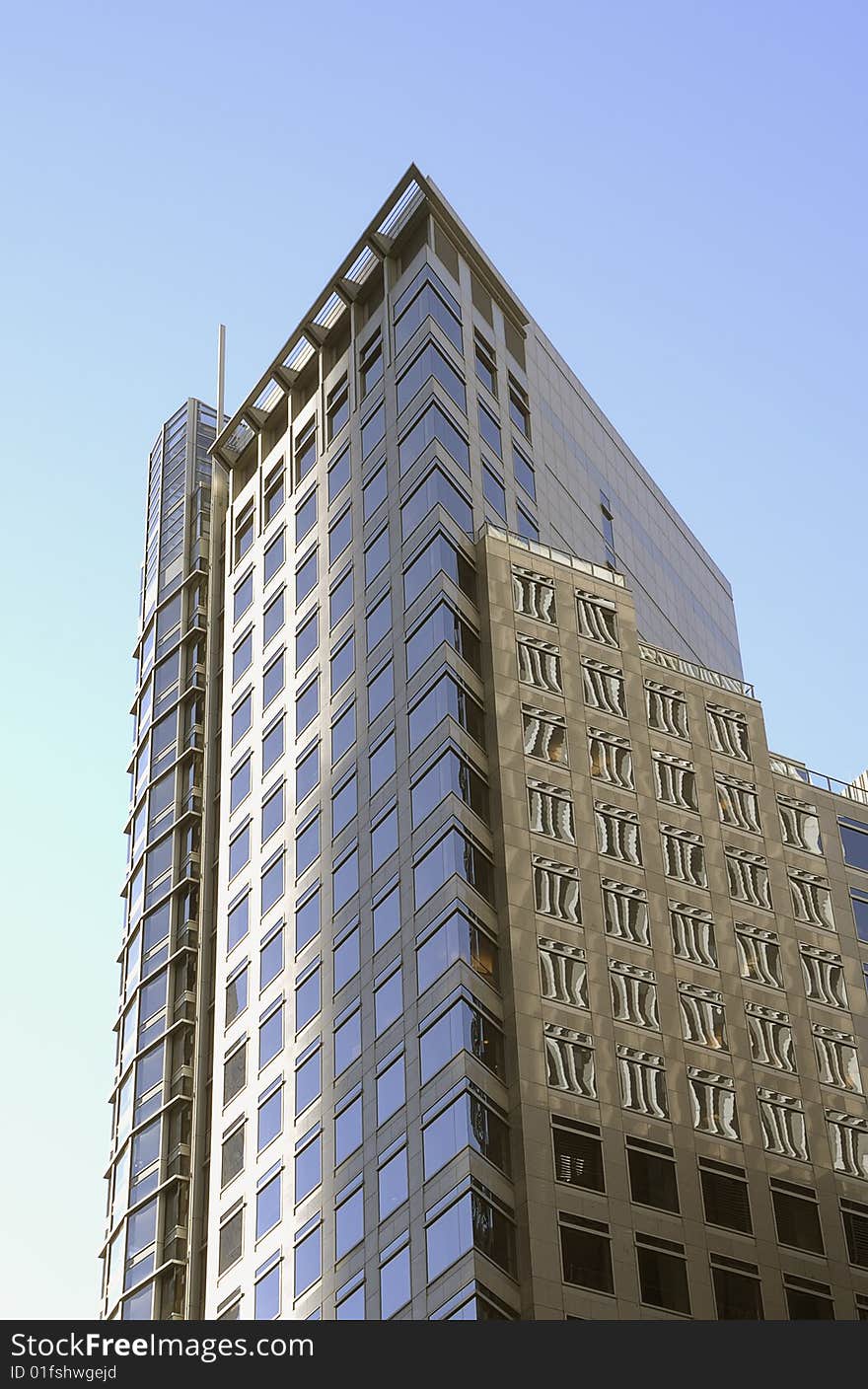 Office Building on a blue sky background.