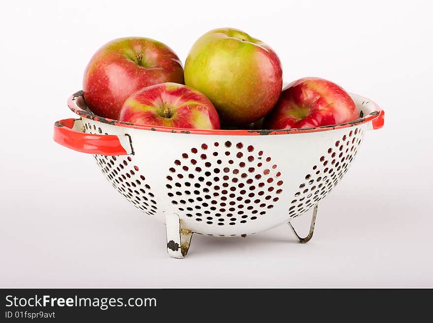 Red apples in vintage colander. Red apples in vintage colander