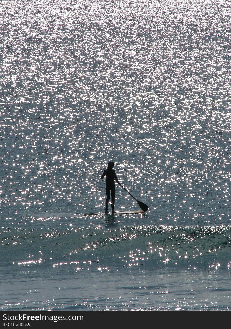 Woman floating on the starry sea relaxing in a zen moment