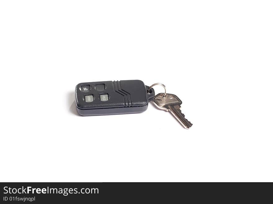 House key with an alarm isolated on white. House key with an alarm isolated on white.