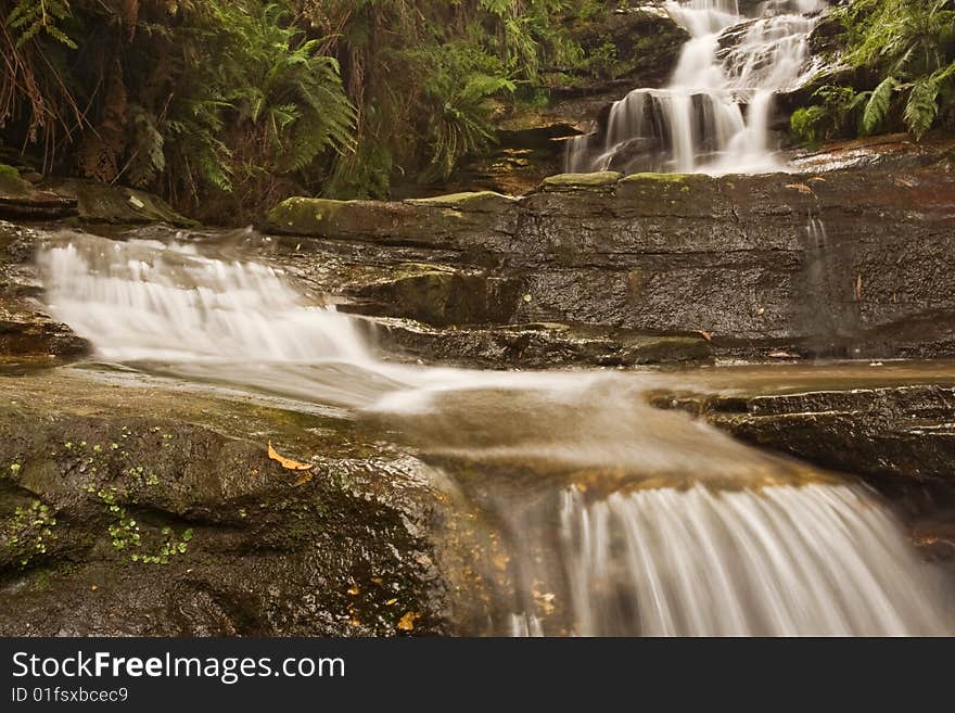 Misty waterfall in Blue mountains National park in NSW, Australia. Misty waterfall in Blue mountains National park in NSW, Australia.