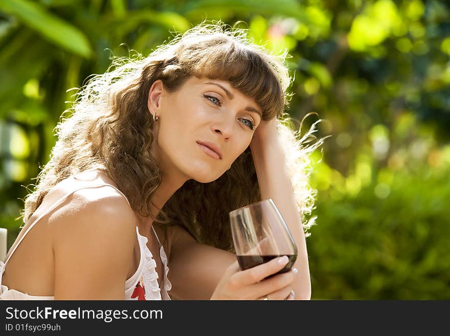 Portrait of young attractive woman having good time in tropic environment. Portrait of young attractive woman having good time in tropic environment