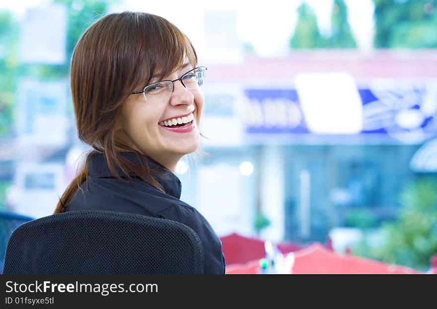 Portrait of young beautiful smiling  girl in office environment. Portrait of young beautiful smiling  girl in office environment