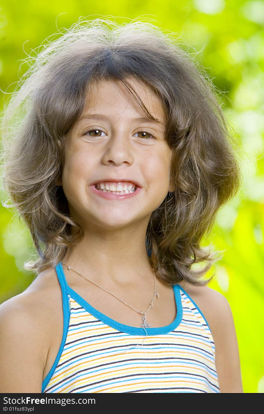 Portrait of little girl having good time in summer environment. Portrait of little girl having good time in summer environment