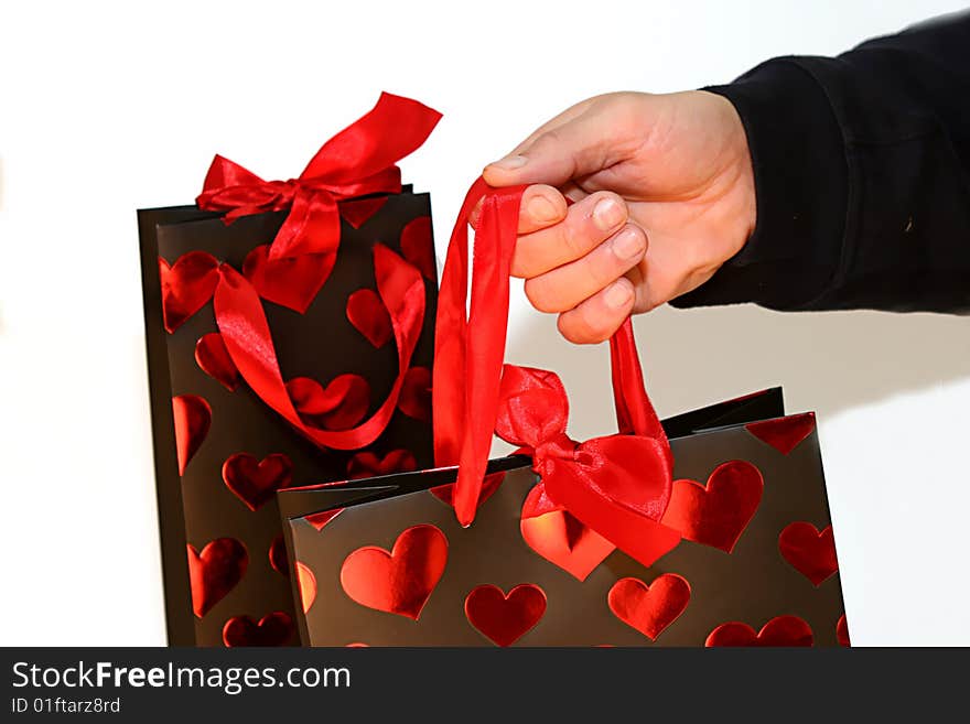 Man holding a valentine bag. Man holding a valentine bag