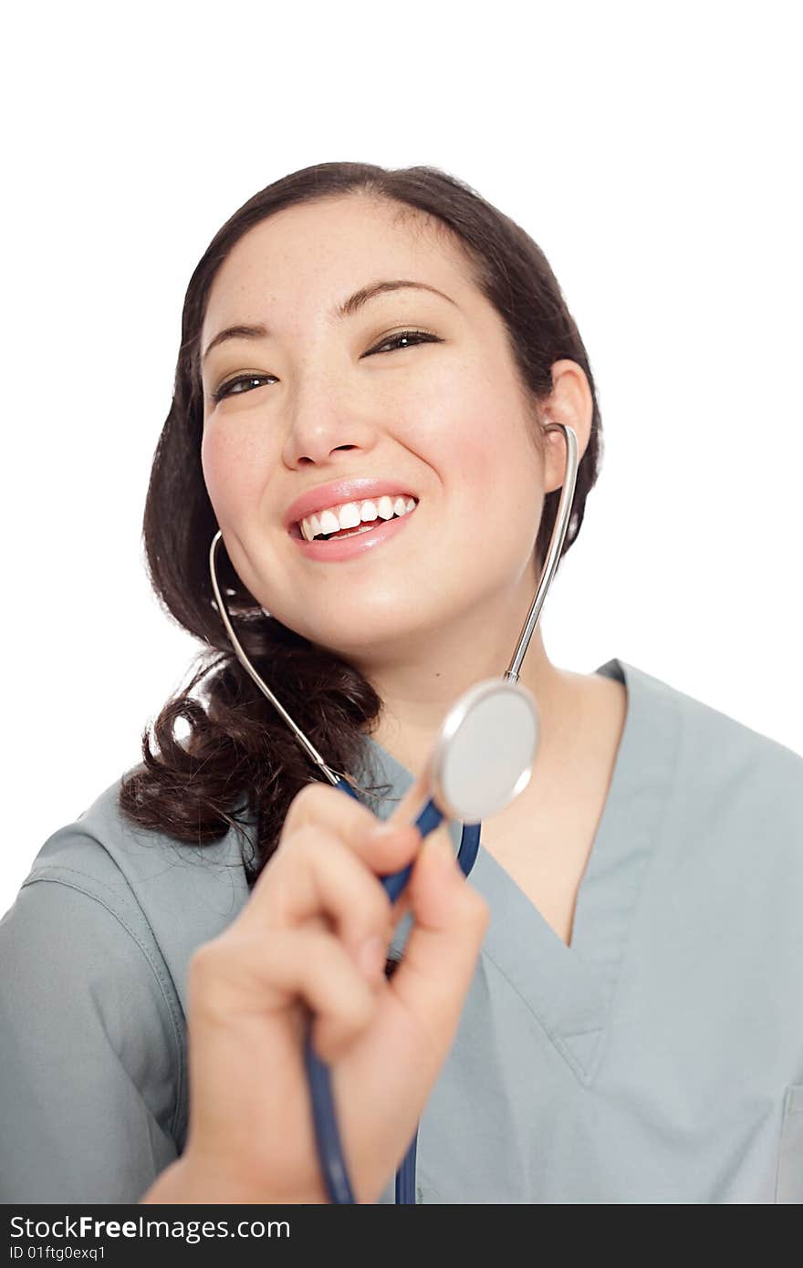 Friendly, smiling nurse listening with a stethoscope. Friendly, smiling nurse listening with a stethoscope