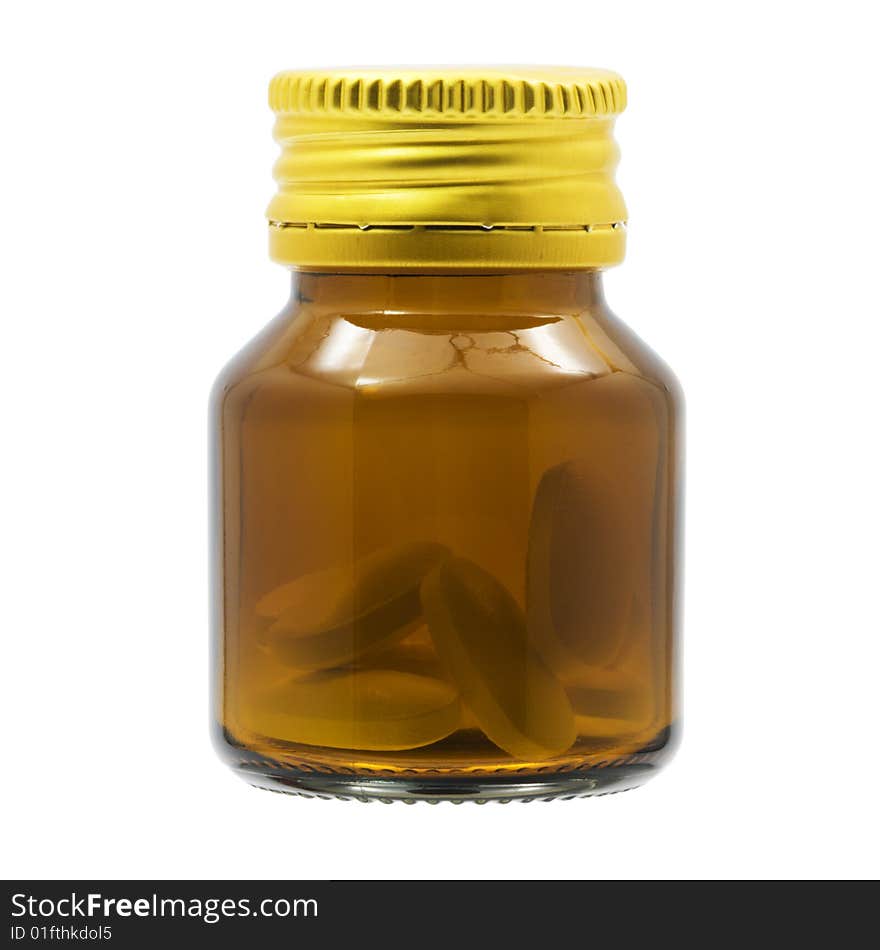 Transparent bottle with pills over white background