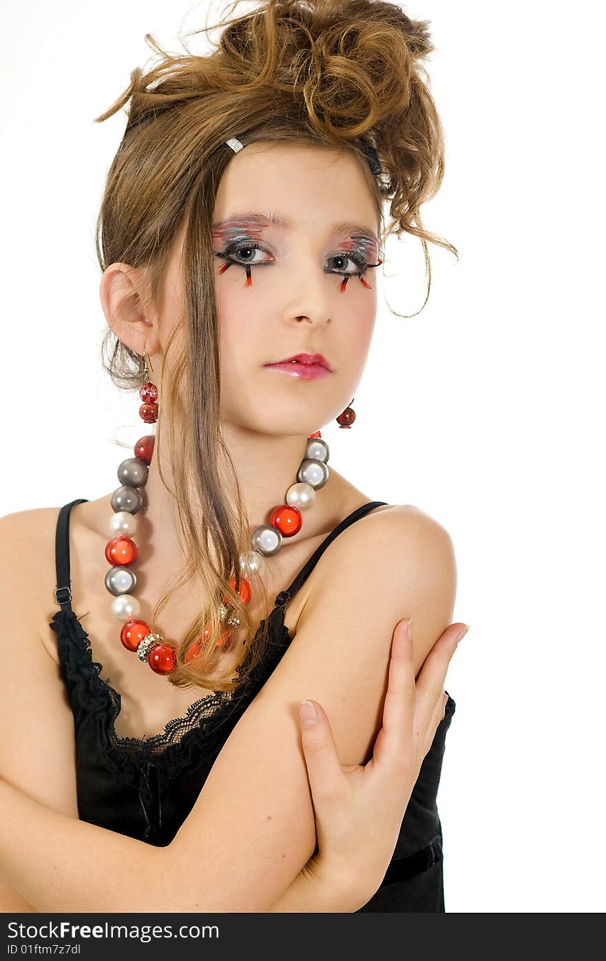 Young fashion girl with special eye makeup, jewelry and black top. Young fashion girl with special eye makeup, jewelry and black top